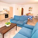 Сasa de vacaciones Lu Affitti Budoni